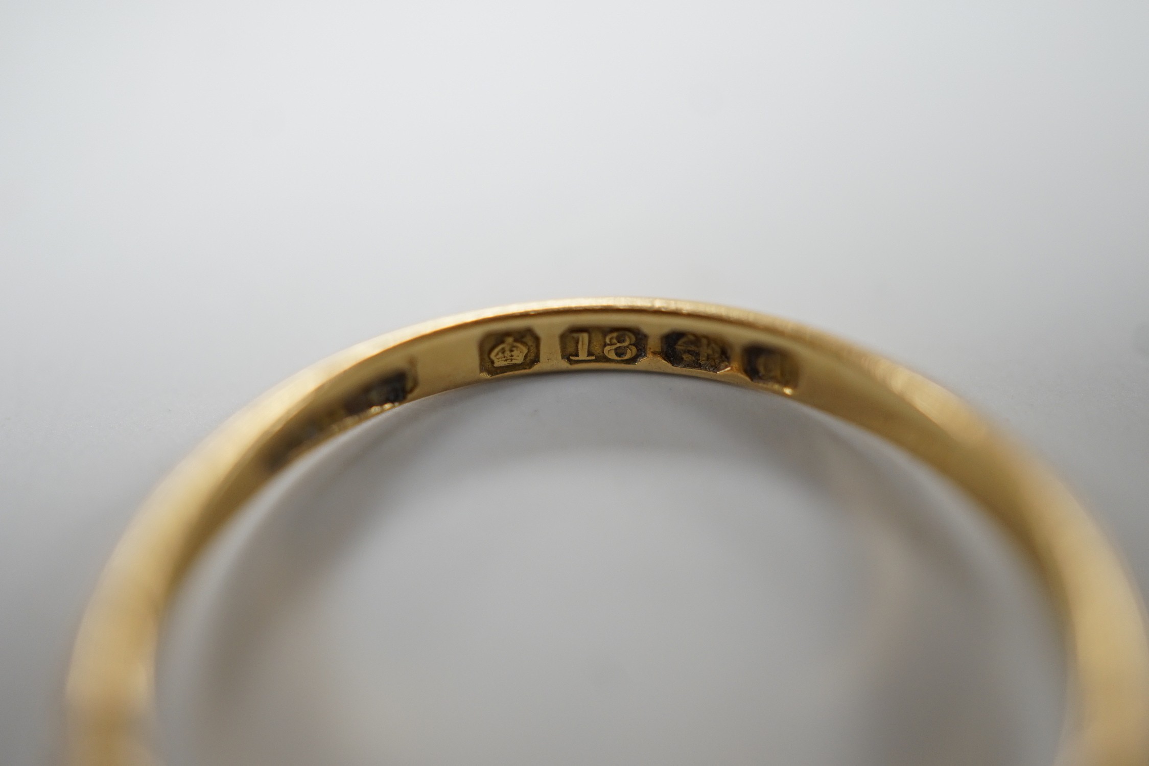 Two early 20th century 18ct, sapphire and diamond set rings, including Edwardian seven stone, size L and K/L
